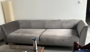 Soft grey velvet 3.5 seater sofa in excellent condition.
