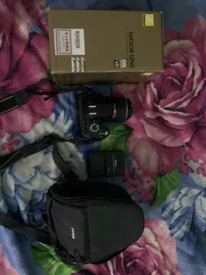 كاميرا نيكون D3200 + عدسة اصافية