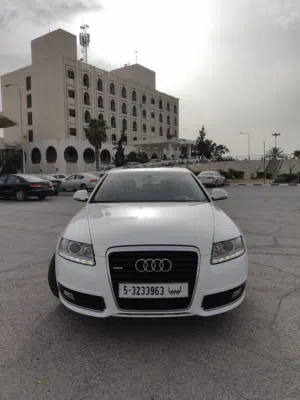أودي A6 موديل 2009 اللون ابيض داخليه جلد عالاكحل