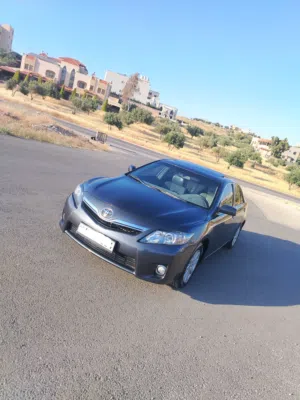 تويوتا كامري هايبرد 2008 كلين تايتل فل كااامل مع فتحه بطاريه الاصليه مركزيه اعلى صنف بحالة الوكاله