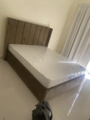 We are selling brand new queen size bed and mattress