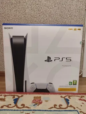 PlayStation 5 with controller and games