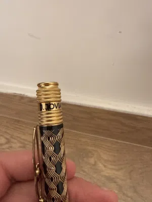 J.Jovial gold and black pen