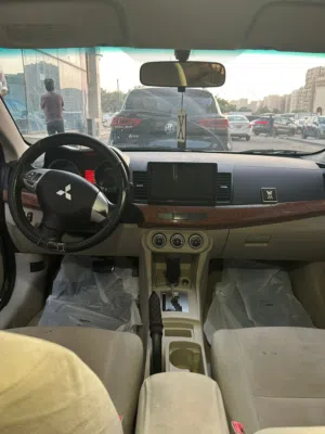 لانسر شارك المكينه الصغيره موديل 2008