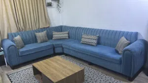 L shape sofa.centre table with 2 drawer. Serving tables