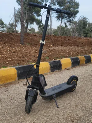 سكوتر كهربائي كبير دفع خلفي 500W للبيع 36V. 11A بمشي من 20الى 25 كيلو