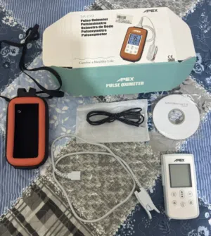 Portable Pulse Oximeter for sale with accessories - looks like new condition