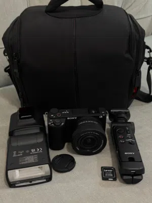 Sony camera still new not used 4 time with warranty and life time clean lenses 26.6 mg with memcard