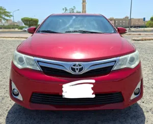 toyota camry(2015),glx.car engine condition is good,good working ac,sunroof working,