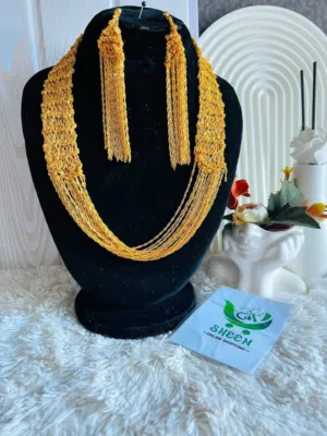 *إطلالة خليجية تفيض فخامة وأناقة* شال مع الأقراط مطلي عيار 21 بتصميم خليجي راقي يخطف الأنظار
