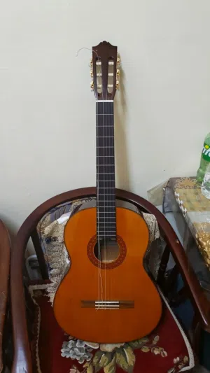 Yamaha c-70 guitar basically brand new Used once,2 strings broken(now removed) bag and pick included