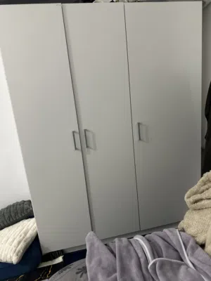 Bed with mattress and closet