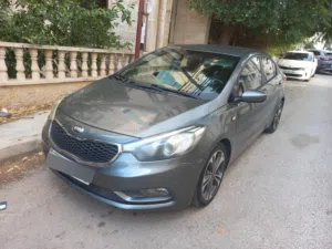سيارة كيا K3 موديل 2014 سيدان وارد كوري عداد 175 الف كم بحالة الوكالة