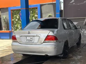 لانسر توماتك