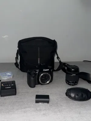 Canon 80D mint condition, no scratches or anything. With accessories