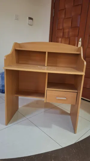 2 wooden Kids Study tables available.