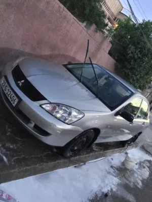 لانسر بومة موديل 2008 للبيع رقم اربيل محرك 1600 وكالة خاصة مكانها بغداد الشعب