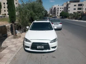 ميتسوبيشي لانسر الفراشه 2009  ماتور 2000cc للبيع