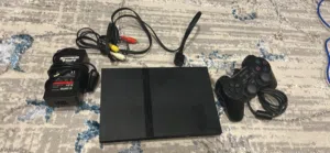 Ps2 slim with games and controller very good condition