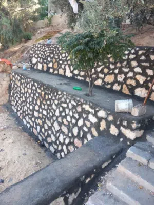 استصلاح اراضي زراعيه بناء سناسل حجريه بناء سلاسل  تشييك اراضي تشييك مزارع تنسيق الحدائق شبكة الري با