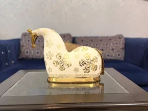 Golden and white decoration piece