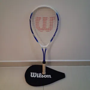 Wilson Impact Pro 500 squash racket featuring a durable blue and white aluminum frame.
