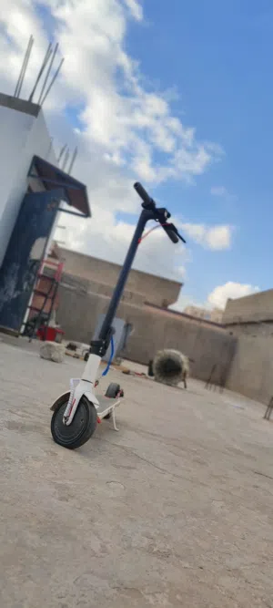 سكوتر الكهربائي شاومي مستعمل بيجميع ملحقاته يبي قوما اممياسعركزيوني