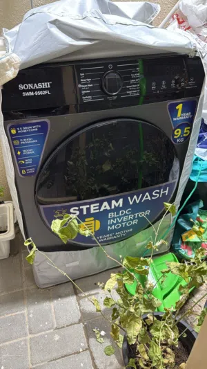 Black colour 9.5 Kg Front Door Washing Machine
