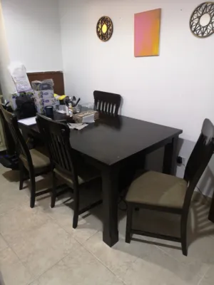 Dining table big with 6 chairs. 6.5 ft x 3.5 ft approx. As is.