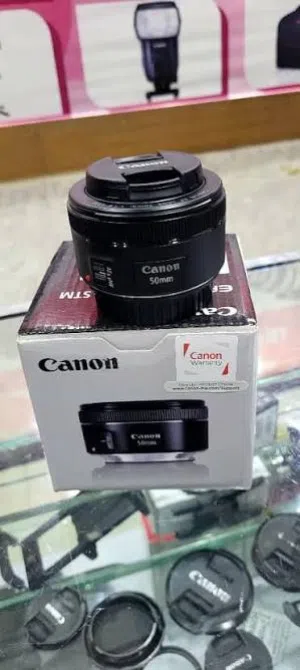 عدسة كانون 50mm فتحة عدسة 1.8