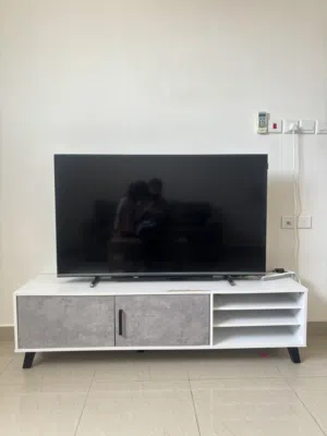 Skyworth smart tv 55 inch and the tv stand