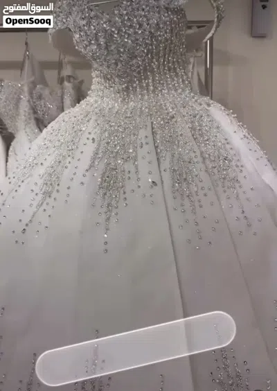 فستان زفاف مميز ملبوس مره واحده 3