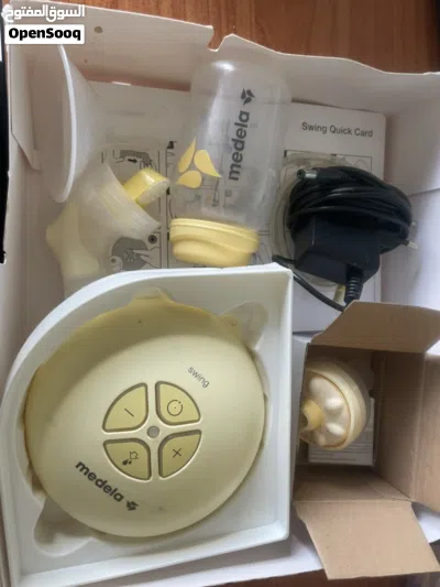 Medela Swing Single Electric Breast شفاط حليب ميديلاPump عبوات حفظ الحليب cooler bag و 4