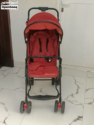 عربة أطفال جيدة الاستعمال 2