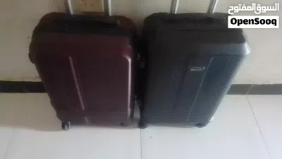 شنط سفر لون احمر و اسود يوجد قطعتين فقط 4