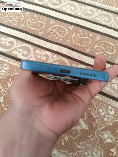 الماركة""شاومي ردمي 14c داكرة:128 RAM:6+6 شبه جديد :وحش الالعاب:2026 الحجم""6.9g 4