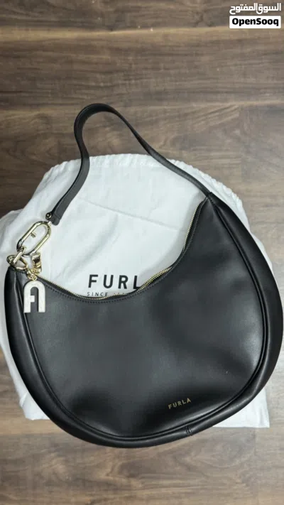new furla crescent bag with charm 2