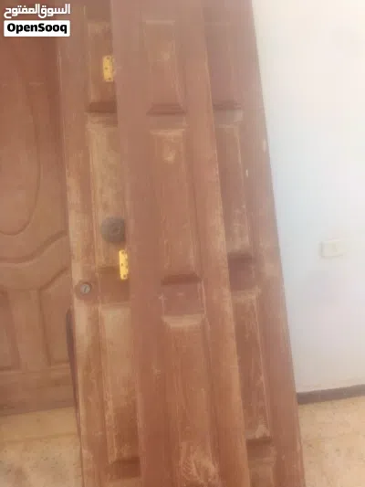 أبواب لوح خارجي وبابين داخليات وباب حديد شبه جديد في تاجوراء 4