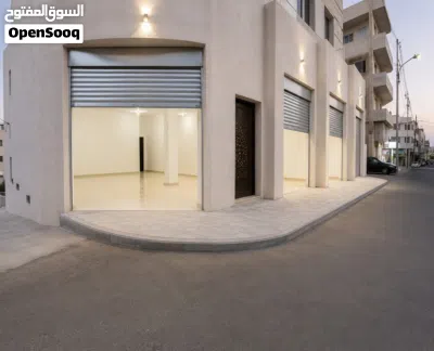 محلين جديدين بابين مفتوحين على بعض للإيجار 2