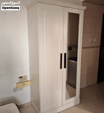 Wardrobe 2 doors with mirror .local made very strong heavy duty like new one month used only 3