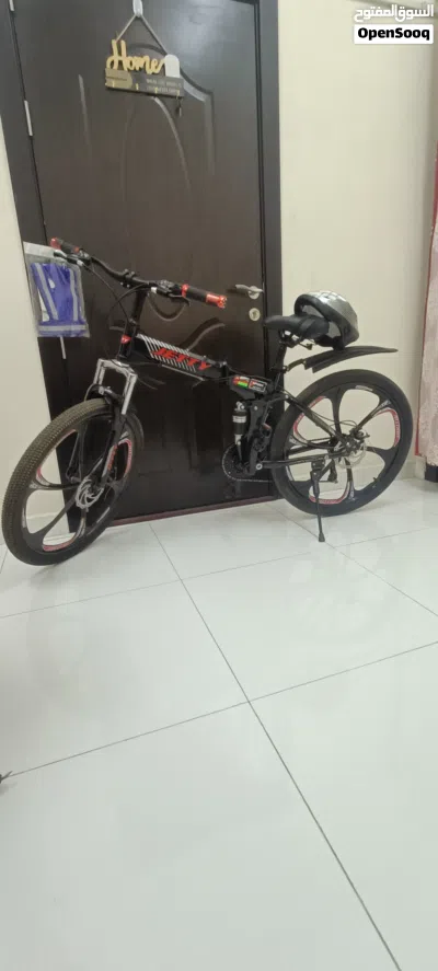 Like-New Geared Folding Bicycle with Helmet & Safety Jacket 2