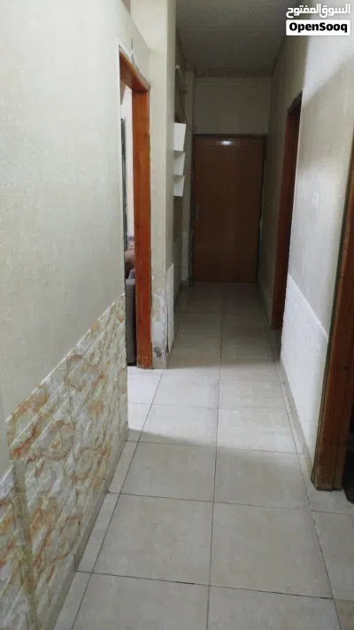 شقة طابق اول في عمارة مكونة من طابقين 4