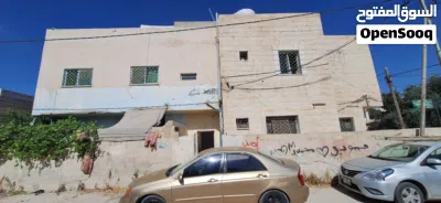 عمارة سكنية اربع شقق طابقين للبيع بسعر مغري جدا في المفرق حي الحسين 2