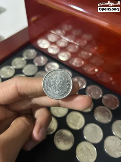 عدد 29 coins من فئة 25سنت cent كندي 3