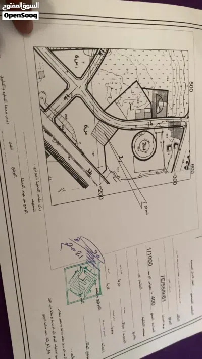 ارض 400متر خلف مصرف تجاري جنب جامعة الرفاق 4