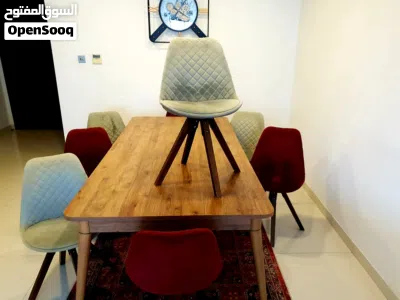 A unique 8-seater dining table with 360-degree swivel chairs 2