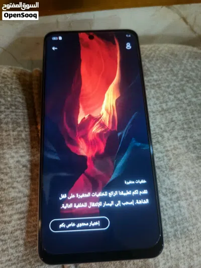 هاتف محمول جديد بحالة ممتازة بسعة 128 جيجابايت ولون أبيض مع ملحقات 2