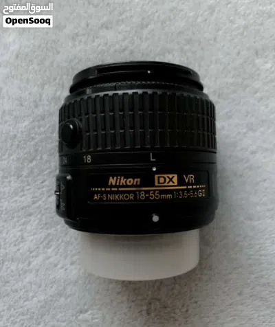 كاميرا تصوير Nikon D5200 مع عدسة سيكما 70-300 مايكرو 3