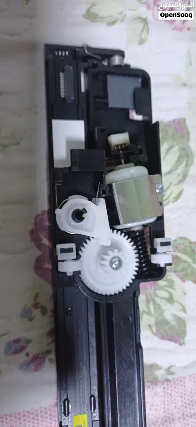 The board appears to be a used component for printer repair or replacement. 2