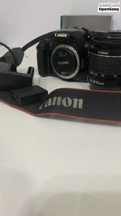 Canon EOS DSLR 1100 with 18-55mm Kit Lens, strap and charger Shutter Counter): 11,355) 3